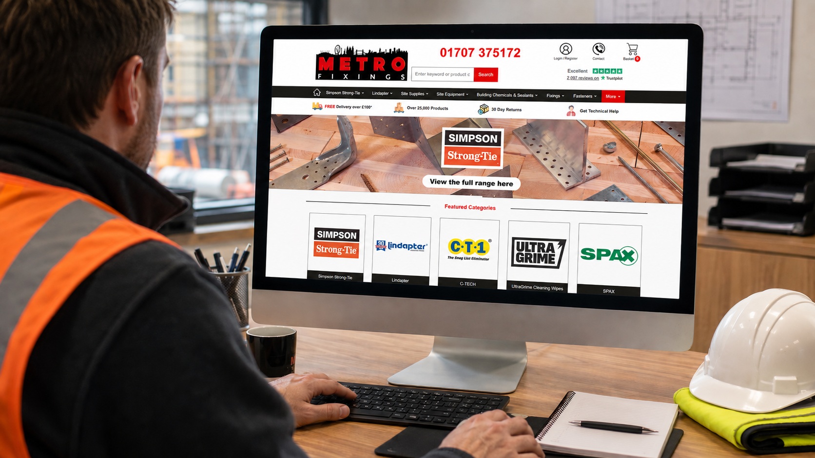 Commercial building contractor placing an online order via the Metro Fixings desktop web platform in a clean trade office space